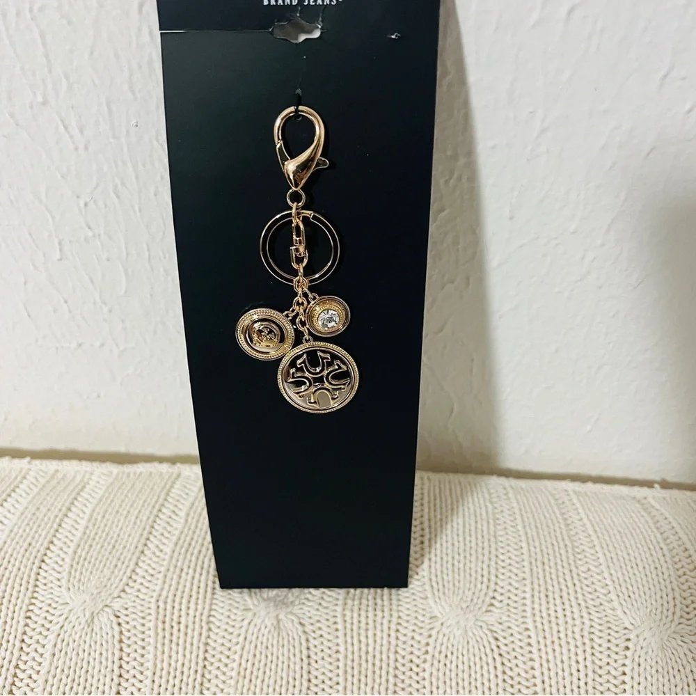 True Religion New Gold Tone Multiple Charms Medallion Key Holder Horseshoe Logo